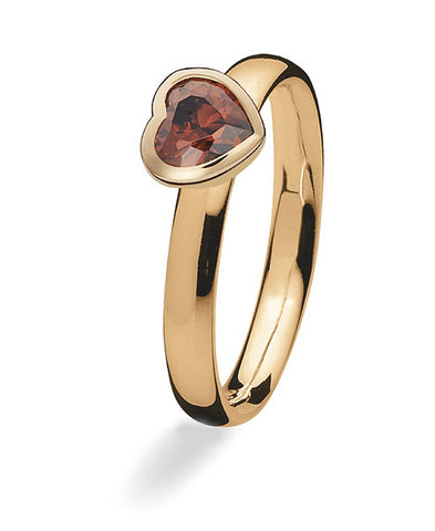9 carat gold Max ring with heart shaped cubic zirconia setting.