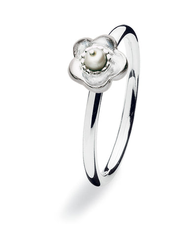 Sterling silver ring featuring freshwater pearl in flower setting.