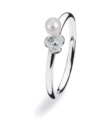 Sterling silver ring with fresh water pearl and flower setting.