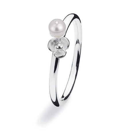 Sterling silver ring with fresh water pearl and flower setting.