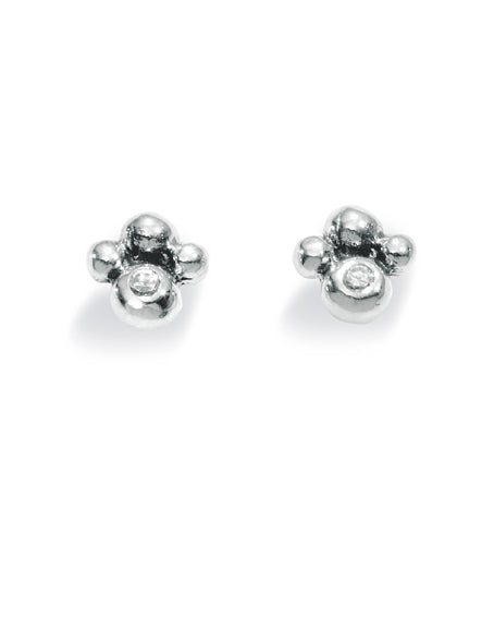 Pair of studs "FLEUR" from Spinning Jewelry, featuring sterling silver with cubic zirconias.