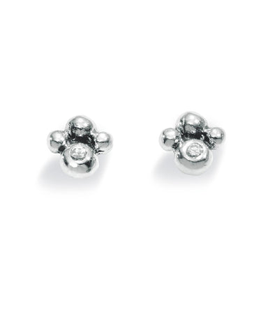 Pair of studs "FLEUR" from Spinning Jewelry, featuring sterling silver with cubic zirconias.
