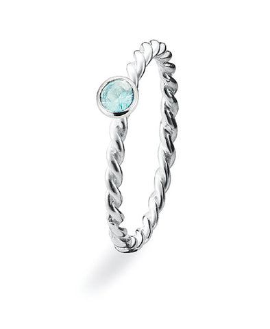 Sterling silver Spinning ring featuring blue stone setting.