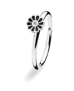 Sterling silver ring with cubic zirconia featuring black enamelled flower setting.