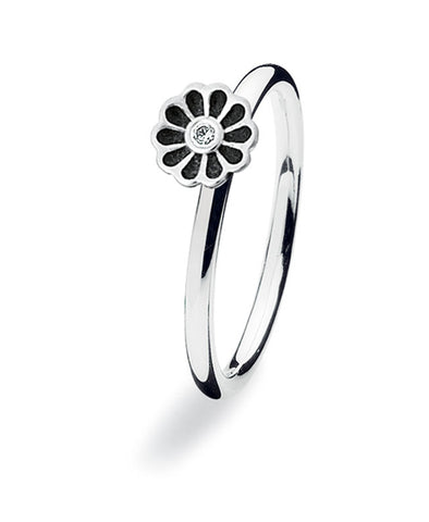 Sterling silver ring with cubic zirconia featuring black enamelled flower setting.