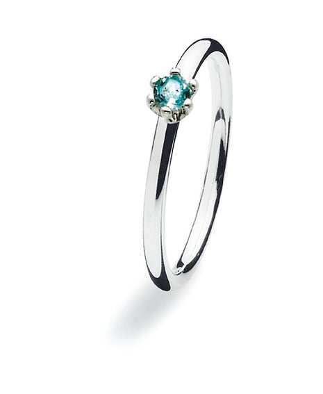 Sterling silver ring with blue topaz.