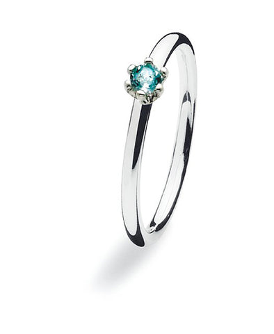 Sterling silver ring with blue topaz.