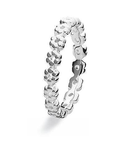 Sterling silver Max ring with flower motif on band.