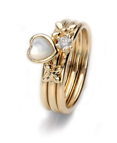 9ct gold ring combination featuring mother-of-pearl and cubic zirconia